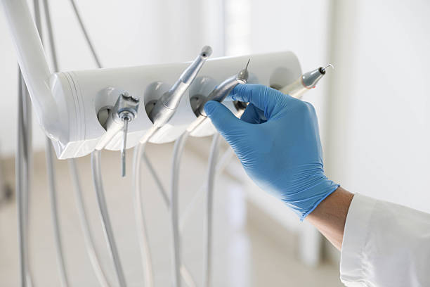 Professional Tooth Extraction technician working in Atkins, IA